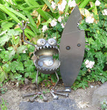 Surfer Holding Shark Bitten Surfboard Gnome Be Gone by Artist Fred Conlon of Sugarpost