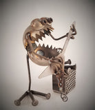 Rocker Playing Guitar, Garden Sculpture by Artist Fred Conlon of Sugarpost