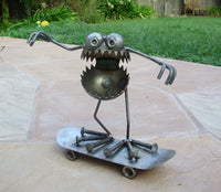 GBG Riding Skateboard, Garden Sculpture by Artist Fred Conlon of Sugarpost